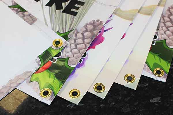 Banners eyleted and hemmed.